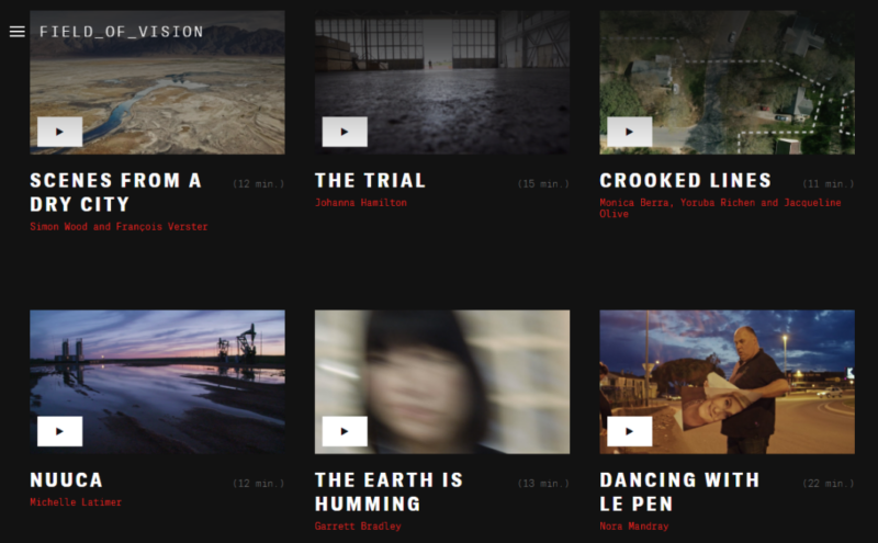 The image shows a grid of six video thumbnails from a platform called "Field of Vision." Each thumbnail includes a play button, title, director(s), and duration. The titles and details are as follows: "SCENES FROM A DRY CITY" by Simon Wood and François Verster (12 min.) "THE TRIAL" by Johanna Hamilton (13 min.) "CROOKED LINES" by Monica Berra, Yvette Lucas, and Jacqueline Olive (22 min.) "NUUCA" by Michelle Latimer (13 min.) "THE EARTH IS HUMMING" by Garrett Bradley (29 min.) "DANCING WITH LE PEN" by Nora Mandray (22 min.) If there's anything else you need, just let me know! Edit in Pages