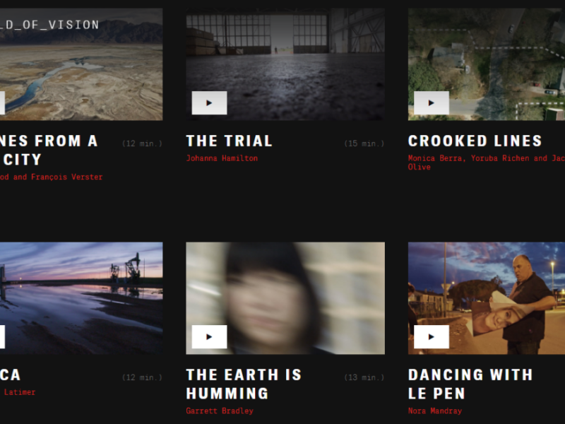 The image shows a grid of six video thumbnails from a platform called "Field of Vision." Each thumbnail includes a play button, title, director(s), and duration. The titles and details are as follows: "SCENES FROM A DRY CITY" by Simon Wood and François Verster (12 min.) "THE TRIAL" by Johanna Hamilton (13 min.) "CROOKED LINES" by Monica Berra, Yvette Lucas, and Jacqueline Olive (22 min.) "NUUCA" by Michelle Latimer (13 min.) "THE EARTH IS HUMMING" by Garrett Bradley (29 min.) "DANCING WITH LE PEN" by Nora Mandray (22 min.) If there's anything else you need, just let me know! Edit in Pages