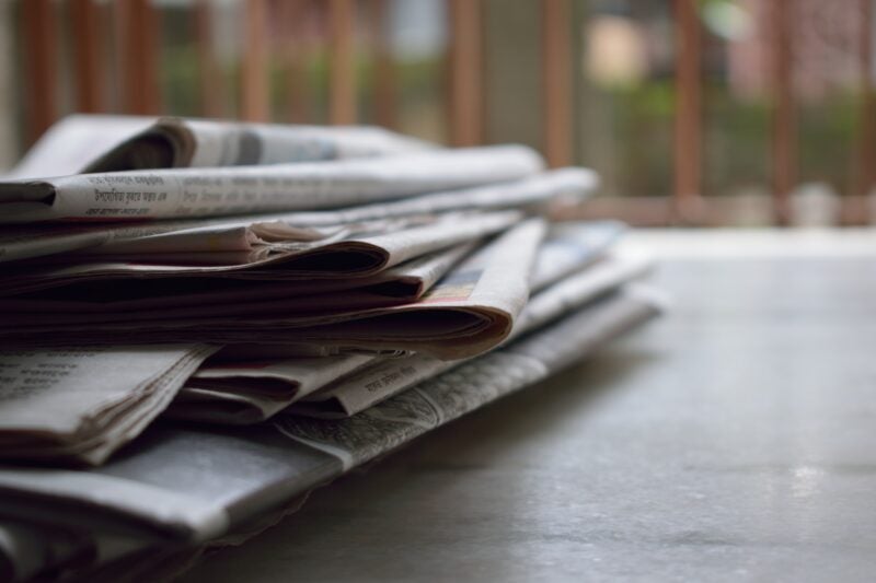 close up image of newspapers