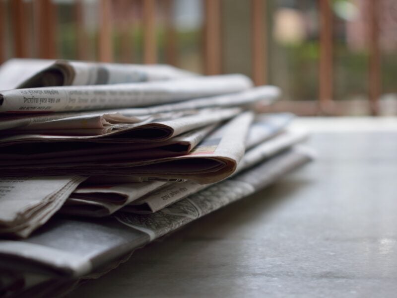 close up image of newspapers