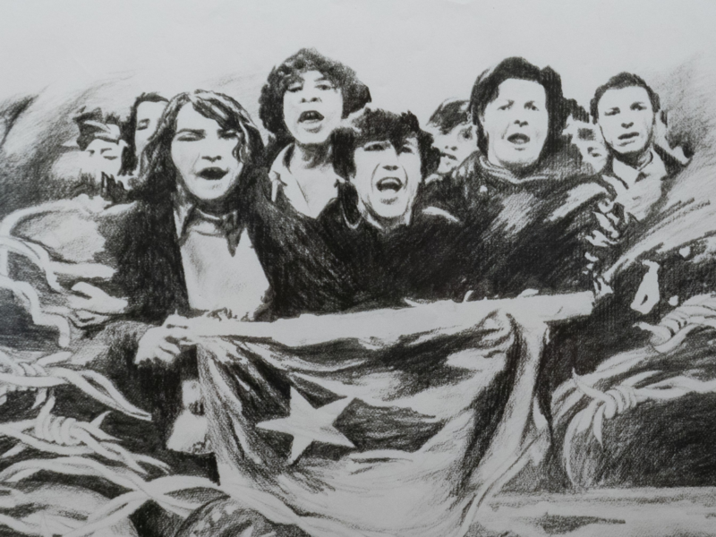 The image shows a group of people holding a flag with a star on it. The image appears to be in black and white,